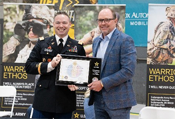 LTC Collins presented Mr. Coltrain with the PaYS plaque.