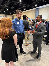 Thomas Parker with Job fair attendees