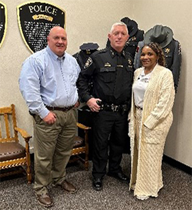 (l-r) Mr. Thomas Newton, Public Information Officer, Sheriff Tobias J. Shelley, Crancena Ross.