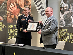 LTC Khrysten Grace, Commander, Minneapolis Recruiting BN presented Derek Goebel, Chief Financial Officer, Altru Health with the plaque of participation.