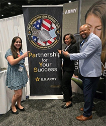 Ms. Leslie Hernandez, Recruiting Administrator, U-Haul International, a PaYS partner, alongside Lakisha Carter-Hyche and Antonio Johnson Sr., pose together at the SHRM Conference.