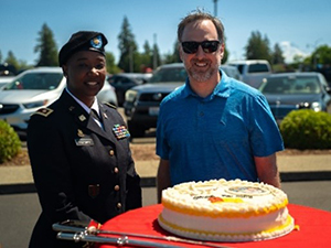 MAJ Norman and Mr. Prothero before the cake cutting reception