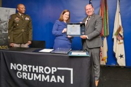 Dr Schaefer presents plaque to Mr. DeMauro on behalf of the U. S. Army PaYS program as COL Thomas shows his support.