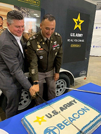 (l-r) McDevitt and  COL Perez slice the ceremonial cake after formal proceedings