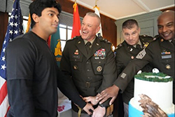 LTG Harter and CSM Betty with a newly sworn-in future Soldier.