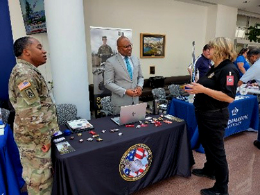 MAJ Steven Brown, Education Director, Soldier For Life, Samuel, and Nicole Stotelmyer, Talent Acquisition Coordinator Maryland DPSCS