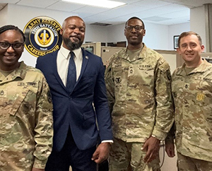 Frank McNeil with soldiers from the Army Reserve Careers Group