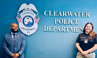 Army PaYS Marketer Victor Fleming with Clearwater Police Department’s Corporal Melody Phelps