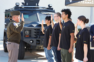 LTC Alvarez with future Soldiers  LTC Alvarez with future Soldiers
