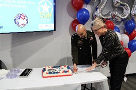 LTC Ramon Ramos and Ms. Stacy Winsett share in the celebration by cutting the ceremonial cake, marking the official signing of the Army PaYS partnership with RATP Dev USA.