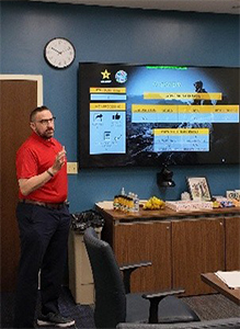 Roy Kidwell delivers a briefing 