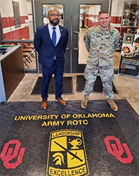 (l-r) Frank McNeil stands with CPT Craig Womack, Assistant Professor of Military Science, ROTC, University of Oklahoma