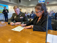 LTC Christopher Sadoski, Commander, Northern California Recruiting Battalion, and Ms. Christine Briceno, Director of Human Resources Napa County sign the ceremonial PaYS document