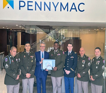 David Spector, CEO and Chairman, Pennymac, and MAJ Tyran Askew, Executive Officer, L.A. Battalion along with Soldiers from the L.A. Recruiting Battalion.
