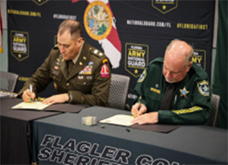 Sheriff Rick Staley and MAJ William Wiseman signed the memorandum of agreement establishing partnership