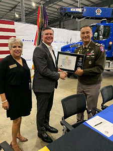 (l-r) CASA Myrna Trevino, Mr. Sean McDevitt, COL Julian Perez with ceremonial plaque