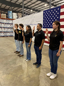 Five Future Soldiers are administered the Oath of Enlistment by COL Perez