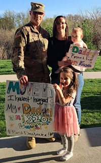 SFC Bolio and his family welcome his return from a mission