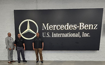 PaYS Marketer, Samuel Armstrong (left) visits point of contacts at Mercedes Benz